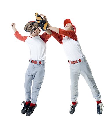 simsearch:640-03259938,k - Two baseball players jumping Stock Photo - Premium Royalty-Free, Code: 640-02766639