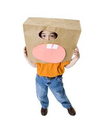 simsearch:700-02756413,k - Portrait of a boy wearing a cardboard box Stock Photo - Premium Royalty-Free, Code: 640-02766832