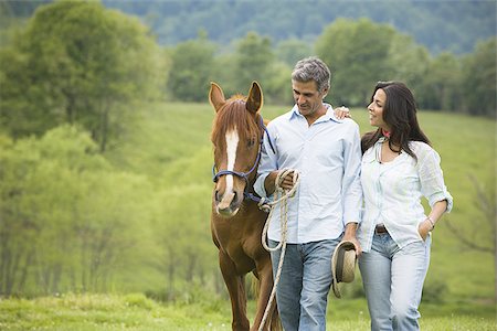 simsearch:640-01356213,k - man and a woman walking with a horse Stock Photo - Premium Royalty-Free, Code: 640-02767486