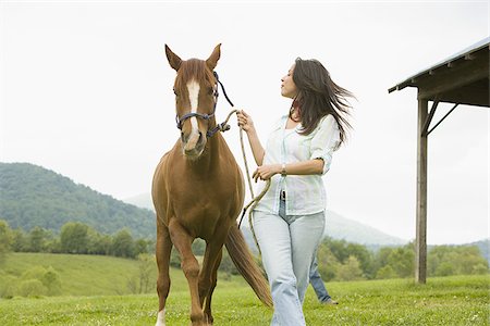 simsearch:640-01356213,k - woman walking with a horse Stock Photo - Premium Royalty-Free, Code: 640-02767481