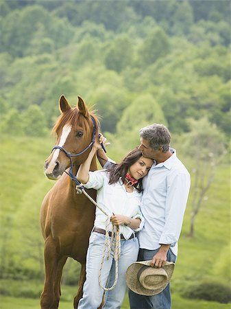 simsearch:640-01356213,k - man and a woman standing with a horse Stock Photo - Premium Royalty-Free, Code: 640-02767499