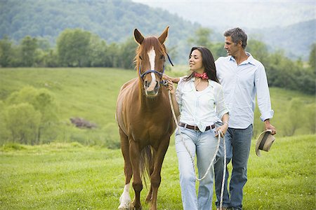simsearch:640-01356213,k - man and a woman walking with a horse Stock Photo - Premium Royalty-Free, Code: 640-02767493