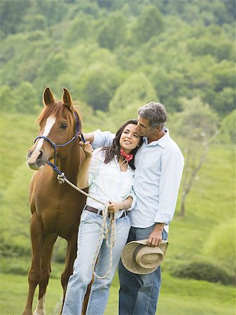 simsearch:640-01356213,k - man and a woman standing with a horse Stock Photo - Premium Royalty-Free, Code: 640-02767500