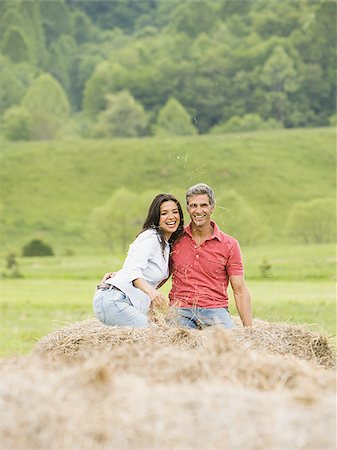 simsearch:640-02767388,k - man and a woman sitting on a hay bale Stock Photo - Premium Royalty-Free, Code: 640-02767539