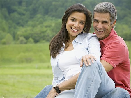 simsearch:640-01356213,k - Portrait of a man and a woman smiling Stock Photo - Premium Royalty-Free, Code: 640-02767557