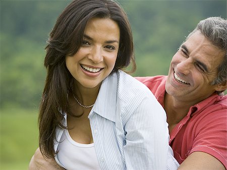 simsearch:640-01356213,k - Close-up of a man and a woman smiling Stock Photo - Premium Royalty-Free, Code: 640-02767562