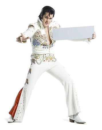 silhouette people performing - Portrait d'un imitateur d'Elvis tenant une pancarte blanche Photographie de stock - Premium Libres de Droits, Code: 640-02767610