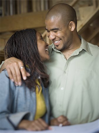 simsearch:640-02764709,k - Portrait of a young couple smiling Stock Photo - Premium Royalty-Free, Code: 640-02767679