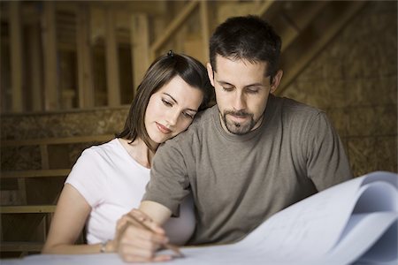simsearch:640-02764709,k - Young couple discussing a blueprint Stock Photo - Premium Royalty-Free, Code: 640-02767683
