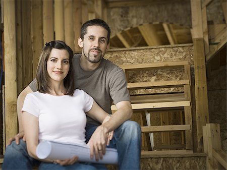 simsearch:640-02764709,k - Portrait of a young couple sitting on a staircase and smiling Stock Photo - Premium Royalty-Free, Code: 640-02767691