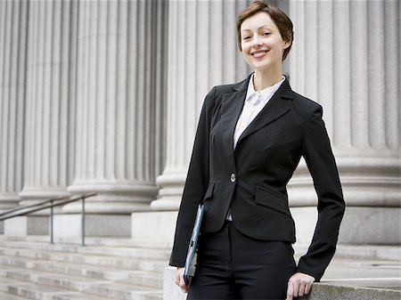 simsearch:640-02767805,k - Portrait of a female lawyer smiling Stock Photo - Premium Royalty-Free, Code: 640-02767805