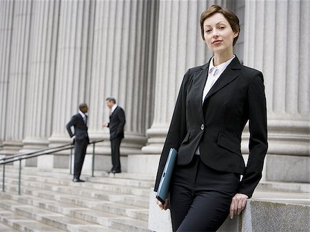 simsearch:640-02767805,k - Portrait of a female lawyer smiling Stock Photo - Premium Royalty-Free, Code: 640-02767807