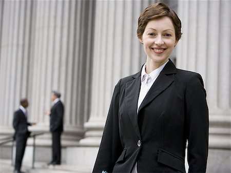 simsearch:640-02767805,k - Portrait of a female lawyer smiling Stock Photo - Premium Royalty-Free, Code: 640-02767808