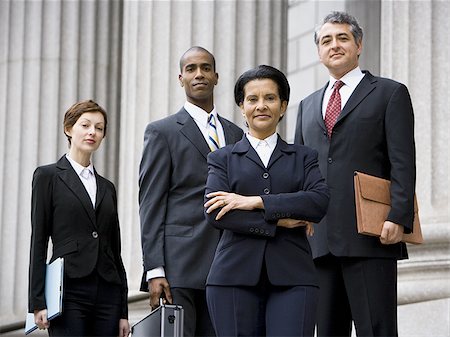 simsearch:640-02767805,k - Portrait of  lawyers smiling in front of a courthouse Stock Photo - Premium Royalty-Free, Code: 640-02767801