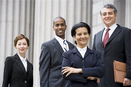 simsearch:640-01351636,k - Portrait of  lawyers smiling in front of a courthouse Foto de stock - Sin royalties Premium, Código: 640-02767803