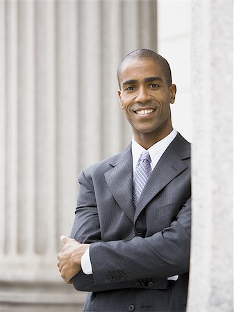 simsearch:640-02767805,k - Portrait of a male lawyer standing with his arms folded Stock Photo - Premium Royalty-Free, Code: 640-02767828