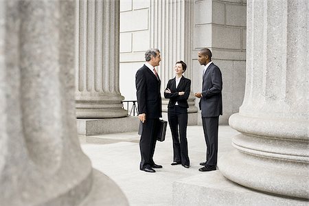 simsearch:640-02767805,k - Three lawyers talking in front of a courthouse Stock Photo - Premium Royalty-Free, Code: 640-02767823