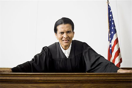 simsearch:640-01350504,k - Portrait of a female judge holding a gavel Foto de stock - Sin royalties Premium, Código: 640-02767835