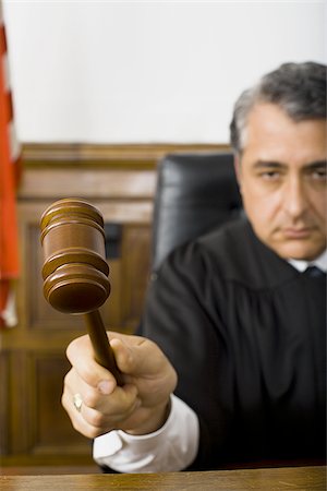 simsearch:640-01351636,k - Close-up of a male judge hitting a gavel on the bench Stock Photo - Premium Royalty-Free, Code: 640-02767898