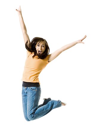 simsearch:640-03259938,k - Portrait of a teenage girl jumping Stock Photo - Premium Royalty-Free, Code: 640-02768076