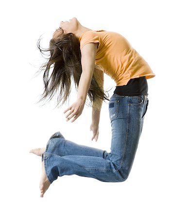simsearch:640-03259938,k - Portrait of a teenage girl jumping Stock Photo - Premium Royalty-Free, Code: 640-02768078