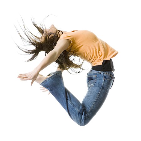 simsearch:640-03259938,k - Portrait of a teenage girl jumping Stock Photo - Premium Royalty-Free, Code: 640-02768080