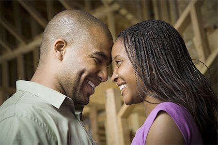 simsearch:640-02764709,k - Close-up of a young couple smiling Stock Photo - Premium Royalty-Free, Code: 640-02768132