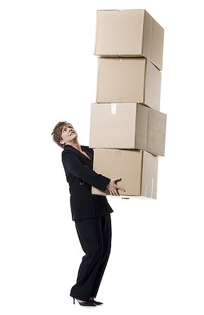 simsearch:614-07194719,k - Profile of a senior woman holding a stack of cardboard boxes Foto de stock - Sin royalties Premium, Código: 640-02768399