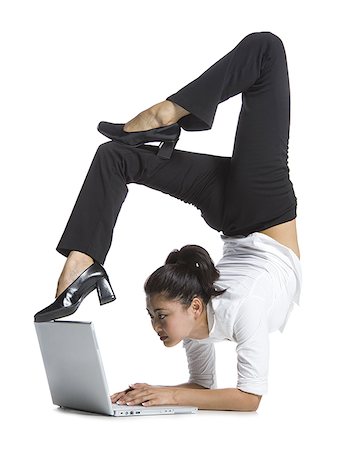 simsearch:640-01363355,k - Female contortionist businesswoman Stock Photo - Premium Royalty-Free, Code: 640-02768607