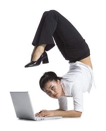 simsearch:640-01363355,k - Female contortionist businesswoman Stock Photo - Premium Royalty-Free, Code: 640-02768608