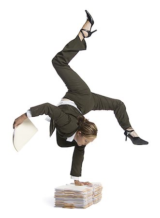 simsearch:640-02768593,k - Female contortionist businesswoman Stock Photo - Premium Royalty-Free, Code: 640-02768603