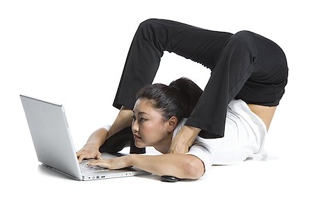 simsearch:640-02768593,k - Female contortionist businesswoman Stock Photo - Premium Royalty-Free, Code: 640-02768610