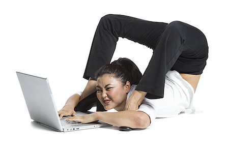 simsearch:640-02768593,k - Female contortionist businesswoman Stock Photo - Premium Royalty-Free, Code: 640-02768611