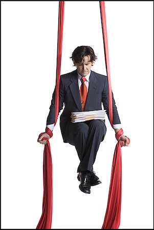 simsearch:640-01363355,k - Businessman tangled in red drapes Stock Photo - Premium Royalty-Free, Code: 640-02768655