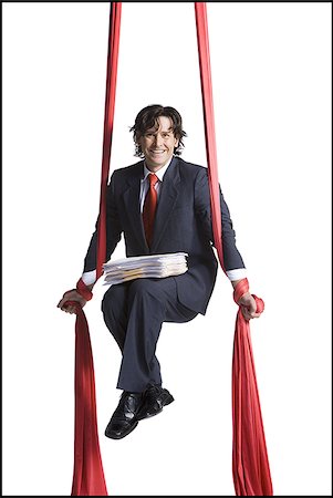 simsearch:640-01363355,k - Businessman tangled in red drapes Stock Photo - Premium Royalty-Free, Code: 640-02768656