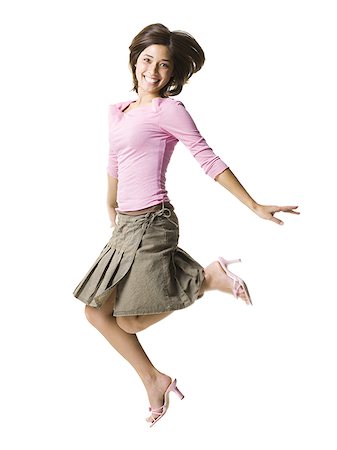 simsearch:640-01601671,k - Woman jumping Stock Photo - Premium Royalty-Free, Code: 640-02768833