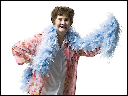 Elderly woman with a feather boa Stock Photo - Premium Royalty-Free, Code: 640-02769393