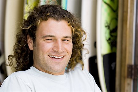 surfboard close up - Man with surfboards outdoors smiling Stock Photo - Premium Royalty-Free, Code: 640-02774220