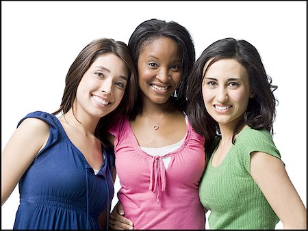 Three women hugging and smiling Stock Photo - Premium Royalty-Free, Code: 640-02774770