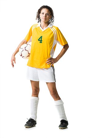 simsearch:640-03256208,k - Teenage girl holding soccer ball souriant Photographie de stock - Premium Libres de Droits, Code: 640-02775901