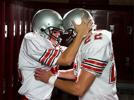 football player in locker room - Two High School football players. Stock Photo - Premium Royalty-Free, Code: 640-02776017