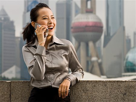 Woman with a cell phone. Stock Photo - Premium Royalty-Free, Code: 640-02776211