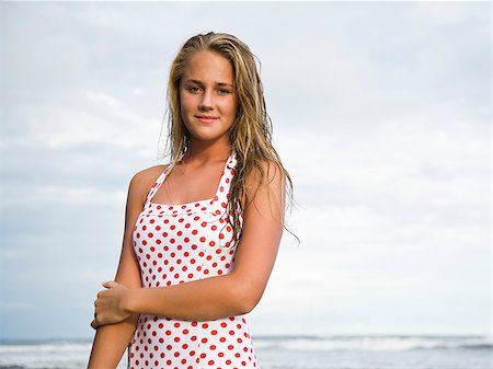 swim wear teen girl - Young woman at the beach. Stock Photo - Premium Royalty-Free, Code: 640-02776635