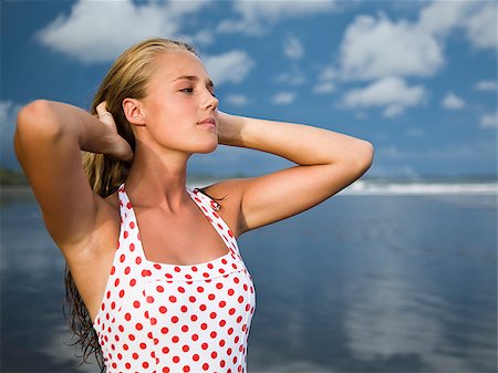 swim wear teen girl - Young woman at the beach. Stock Photo - Premium Royalty-Free, Code: 640-02776631