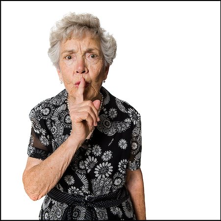 shhh - Senior woman shushing camera. Stock Photo - Premium Royalty-Free, Code: 640-02776805