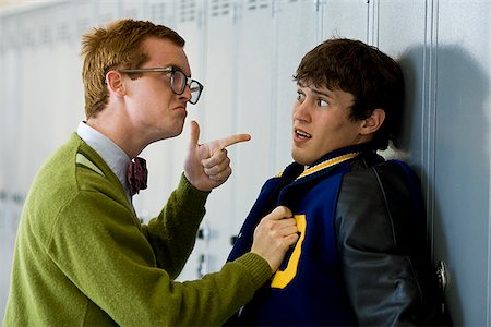 school jocks - Nerd picking on jock. Stock Photo - Premium Royalty-Free, Code: 640-02776840