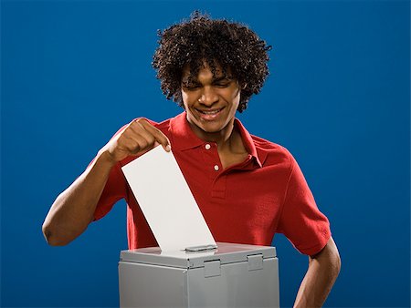 simsearch:640-02776875,k - young man casting a ballot. Stock Photo - Premium Royalty-Free, Code: 640-02776918