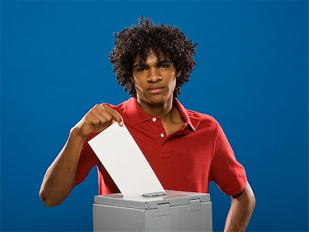 simsearch:640-02776875,k - young man casting a ballot. Stock Photo - Premium Royalty-Free, Code: 640-02776919