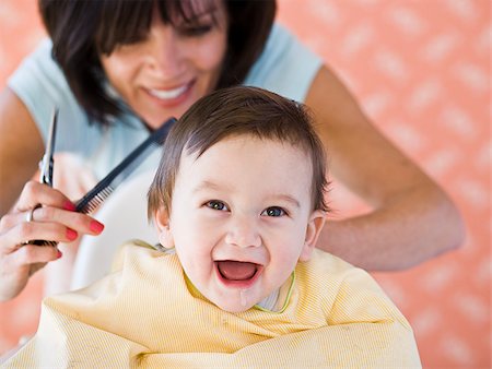 Baby getting a haircut. Stock Photo - Premium Royalty-Free, Code: 640-02777358