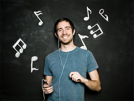 man against a chalkboard Stock Photo - Premium Royalty-Free, Code: 640-02778368